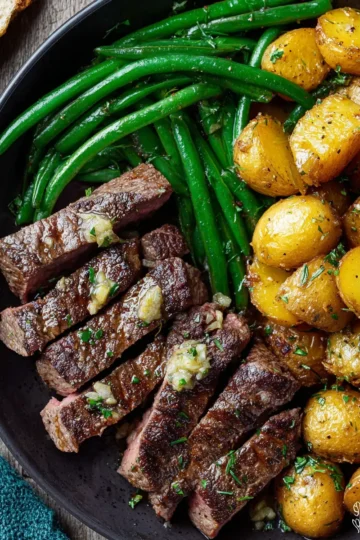 Pan-Seared Steak with Garlic Butter, Herb Potatoes & Green Beans