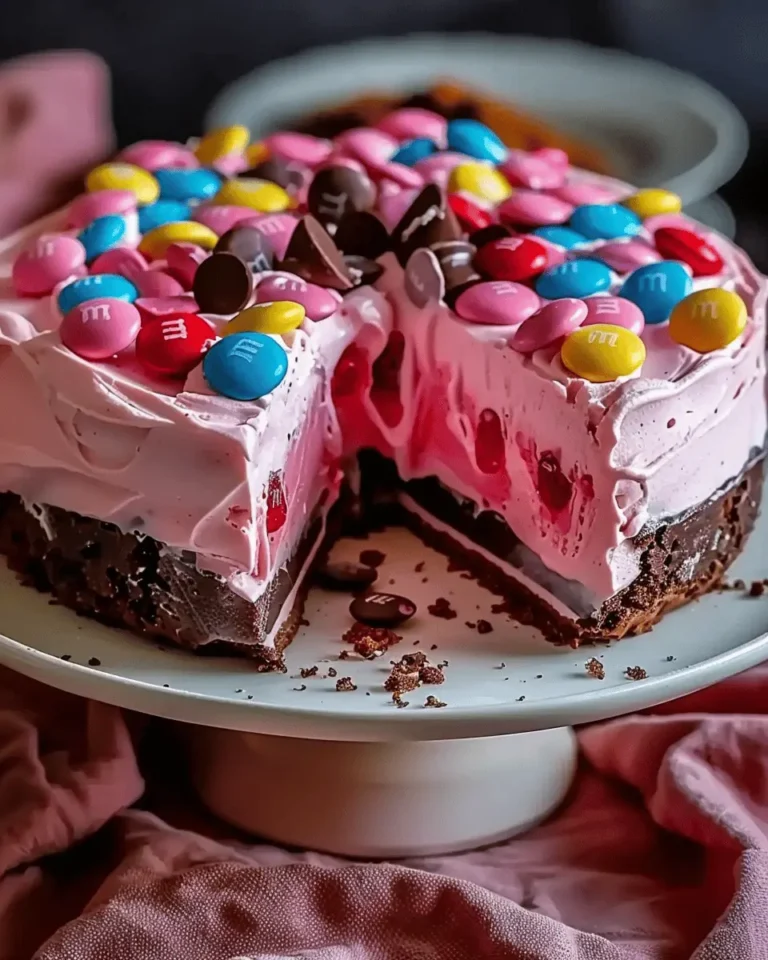 Pink M&M Snickers Cheesecake